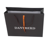 Order Custom Printed Paper Merchandise Bag Business Packaging Online With Eyelet