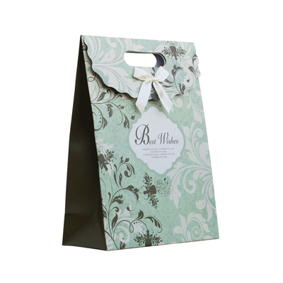 Buy Custom Wedding Gift Paper Bags with Die-Cut Handles & Ribbon – Luxury Party & Event Packaging online manufacture