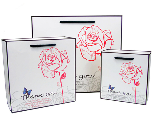 Custom Luxury White Paper Carry Bag With Artwork Printing Manufacturers