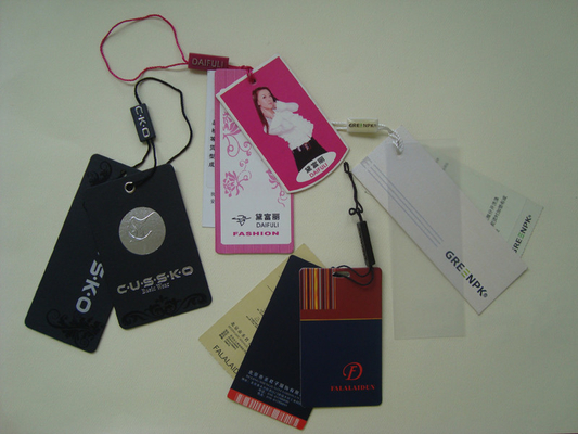 Printed Paper Hang Tags For Clothing Line Plastic Seal Tag UV Coating Silver Foil Logo